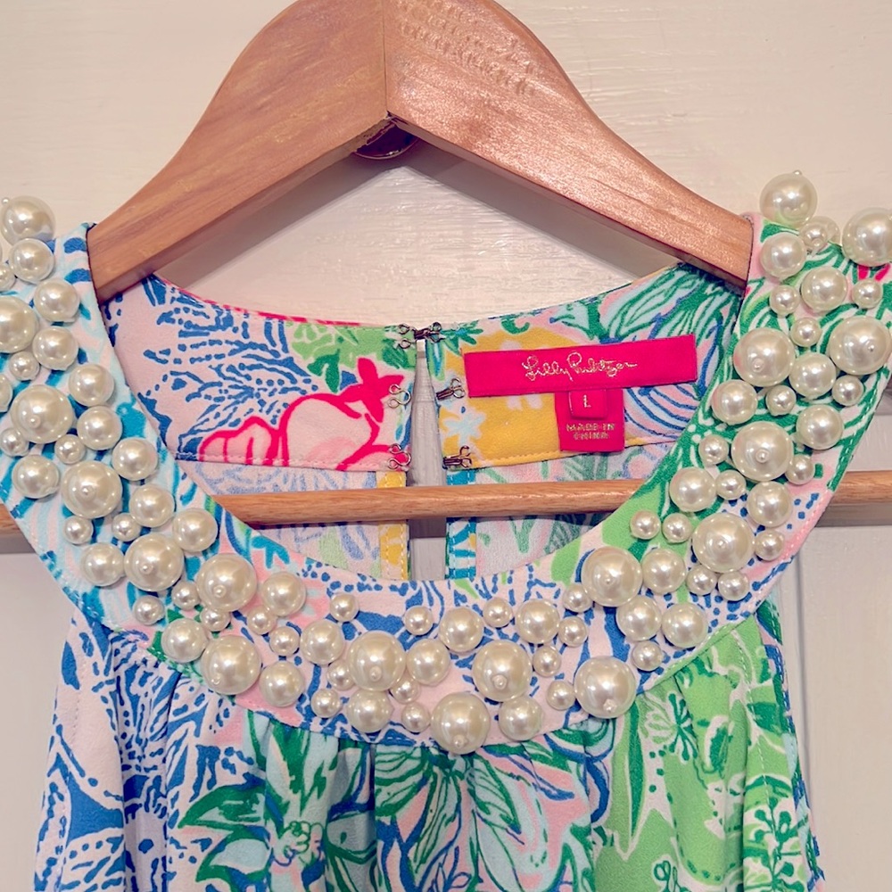 Lilly Pulitzer pearl neck line maxi dress.